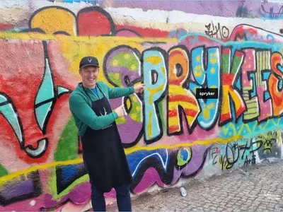 Guido at the office art wall