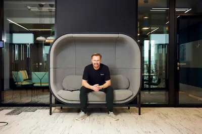 Guido working on a couch during a casual work session