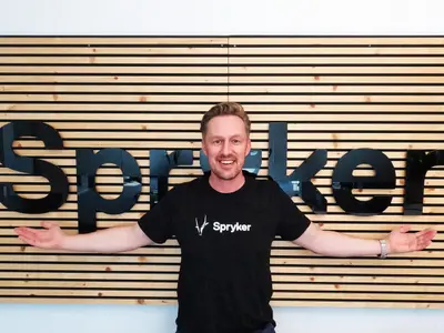 Guido at the Spryker office wall